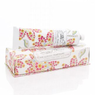 Two floral-patterned rectangular boxes stacked, likely packaging for cosmetics or skincare.