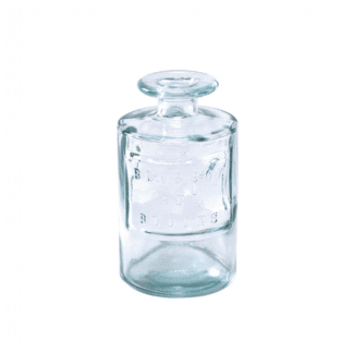 Clear glass bottle with a stopper, containing water.