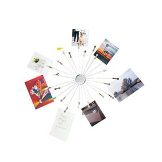 A circular arrangement of various postcards and photos on a white background.