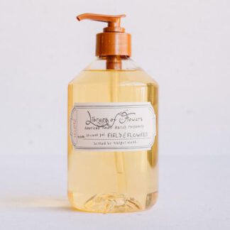 Clear liquid soap in a pump bottle with a vintage label.