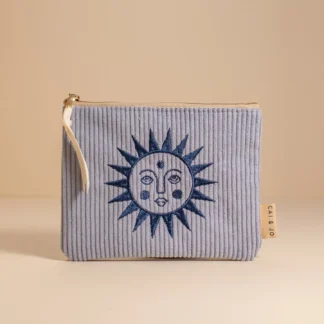 Small pouch with sun and moon embroidery in blue.