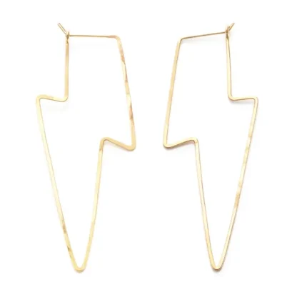 Gold-tone lightning bolt-shaped earrings with a minimalist design.