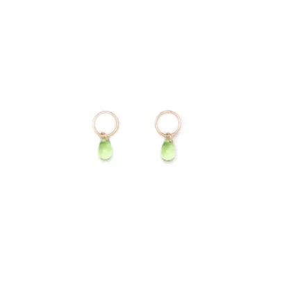 Elegant gold hoop earrings with small green drop pendants.