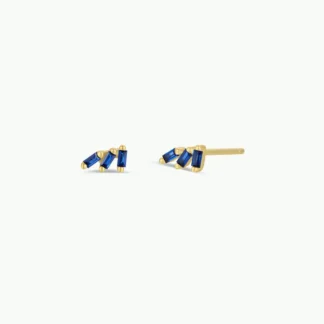 Elegant gold earrings with blue and white stones.
