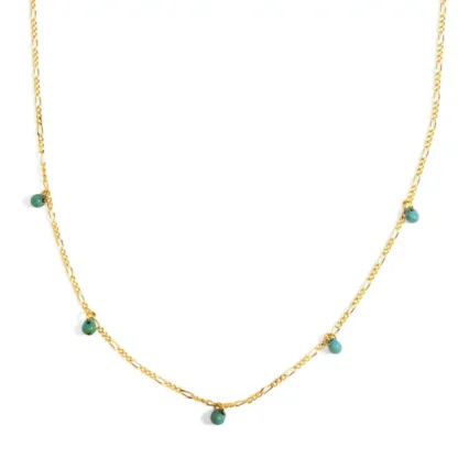 Delicate gold chain necklace with small green gemstone charms.