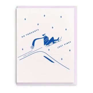 Minimalist snowy mountain scene with skier and stars.